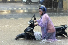 Heavy rain hits Hanoi, flooding risk remains high
