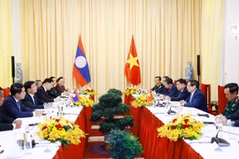 At the meeting between Prime Minister Phạm Minh Chinh and General Secretary of the Lao People’s Revolutionary Party (LPRP) and President of Laos Thongloun Sisoulith in Ho Chi Minh City on April 29. (Photo: VNA)
