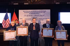 General Secretary of the Communist Party of Vietnam (CPV) Central Committee and President To Lam presents Friendship Orders to American friends and posthumously confers them on others, in New York on September 21 (local time). (Photo: VNA)