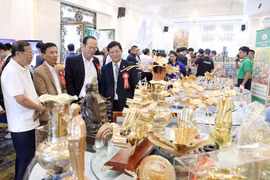 Trade promotion emerges as a vital bridge connecting businesses, cooperatives and producers with domestic and international markets, helping strengthen the competitiveness of Vietnamese products. (Illustrative photo: VNA)
