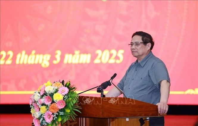 Prime Minister Pham Minh Chinh speaks at the working session with the Standing Board of the Binh Dinh provincial Party Committee on March 22. (Photo: VNA)