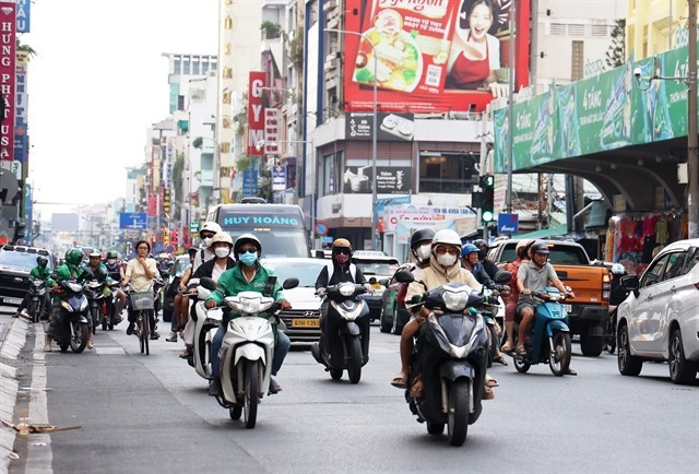 Vehicles in HCM City. The city considers installing hundreds of additional monitoring stations for air quality control. (Photo: VNA)