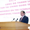PM Pham Minh Chinh addresses the conference on the establishment of the International Financial Centre (IFC) in Vietnam on December 21. (Photo: VNA)