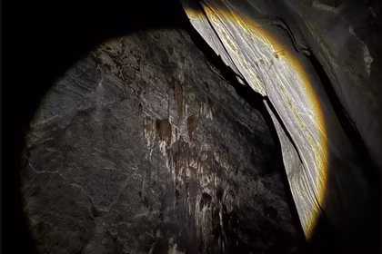 Stalactite formations inside the newly discovered cave. (Photo: Nam Quang Tri Special-use Forest Management Board) 
