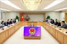 The meeting between Deputy Prime Minister Ho Duc Phoc and WB Vice President for the East Asia and Pacific Region Carlos Felipe Jaramillo in Hanoi on November 25 (Photo: VNA)