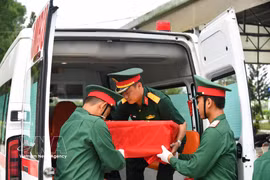 Samples are trucked for airlift to Hanoi for DNA testing at the Can Tho Martyrs’ Cemetery on July 2, 2026. (Photo: VNA)