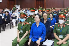Truong My Lan (front, centre) and accomplices at the appeal trial that started on March 25, 2025. (Photo: VNA)