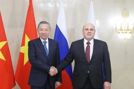 Party General Secretary To Lam (left) meets with Russian Prime Minister Mikhail Mishustin in Moscow on May 8. (Photo: VNA)