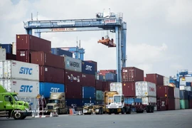Containers of goods are handled at Cat Lai Port, Ho Chi Minh City. (Photo: VNA)
