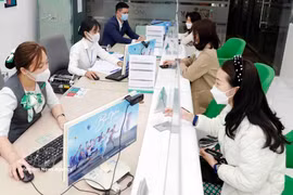 Banks remain the economy’s primary funding artery just as the battle for deposits intensifies. (Photo: VNA)
