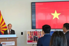 Vietnamese Ambassador to the US Nguyen Quoc Dung addresses the exhibition. (Photo: VNA)
