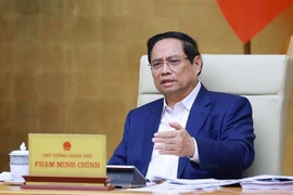 PM Pham Minh Chinh speaks at the Government meeting on December 6. (Photo: VNA)