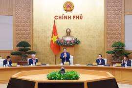 PM Pham Minh Chinh chairs the Government’s regular meeting on December 6. (Photo: VNA)