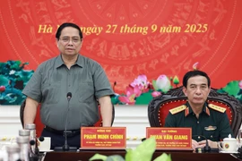 Prime Minister Pham Minh Chinh speaks at the meeting with the Central Military Commission and the Ministry of National Defence on September 27. (Photo: VNA)