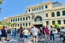 International visitors at the renowned HCM City Central Post Office in downtown District 1. (Photo: VNA)