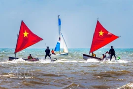 A series of marine sports activities such as sailing, flyboarding, stand-up paddleboarding (SUP) and jet surfing along Thuy Van beach showcase the city’s potential in developing its marine economy and high-end tourism services. (Photo: VNA)