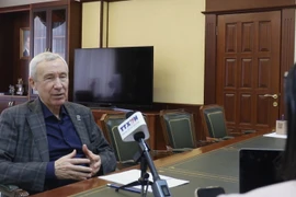 Andrey Klimov, member of the Presidium of the Supreme Council of the United Russia Party (UR), grants an interview to the Vietnam News Agency. (Photo: VNA)
