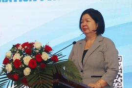 Chairwoman of the Vietnam Cooperative Alliance Cao Xuan Thu Van speaks at the workshop on December 2. (Photo: VNA)