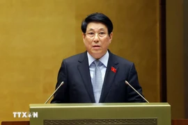 President Luong Cuong delivers a report on the State leader's performance during the 2021–2026 term at the 15th National Assembly’s 10th session on October 20. (Photo: VNA)
