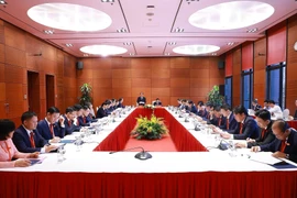 Delegates join a group discussion within the preparatory session of the first Congress of the Government’s Party Organisation on October 12, 2025. (Photo: VNA)