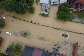 An area flooded following heavy rains in Aceh province of Indonesia (Photo: Xinhua/VNA)
