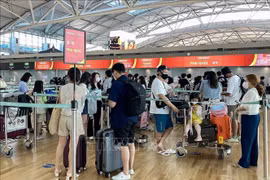 Korean passengers wait to check in at the RoK's Incheon International Airport for a flight to Vietnam's Phu Quoc Island. (Photo: VNA)
