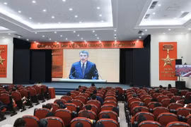Party members of the Vietnam News Agency attend the event via videoconferencing on February 7. (Photo: VNA)