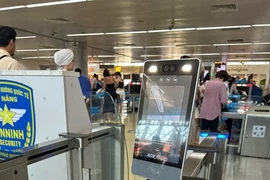 A Face ID system set up a security check-point in Da Nang International Airport. The airport is the first in Vietnam to apply completely automated service for passengers from check-in to boarding. (Photo courtesy of ACV Da Nang)