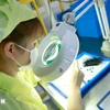 Electronic component manufacturing. (Photo: VNA)