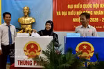 A Cham ethnic voter casts her ballot at Polling Station No. 26 in Gia Dinh ward, Ho Chi Minh City, on March 15. (Photo: VNA) 