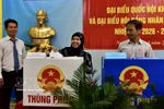 A Cham ethnic voter casts her ballot at Polling Station No. 26 in Gia Dinh ward, Ho Chi Minh City, on March 15. (Photo: VNA) 