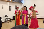 Artists perform the Vietnamese folk song “Trong Com” in a French-language adaptation. (Photo: VNA)