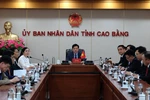 The Cao Bang delegation attends the teleconference with the People’s Government of China’s Guangxi Zhuang Autonomous Region. (Photo: VNA)
