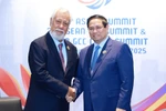 Prime Minister Pham Minh Chinh (R) meets with his Timor-Leste counterpart Xanana Gusmao. (Photo: VNA)