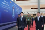 State President Luong Cuong (L) inspects preparations for the signing ceremony of the United Nations Convention against Cybercrime at the National Convention Centre in Hanoi. (Photo: VNA)