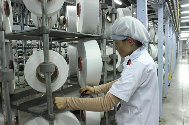 How does yuan price reduction affect garment, footwear industries?