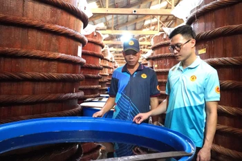 Huynh Khoa Phu Quoc fish sauce barrels (Photo: VNA) 