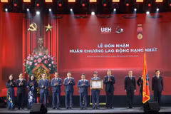 Top leader urges economics university to develop high-quality human resources, nurture talent