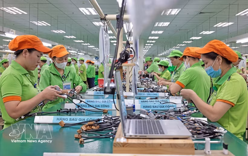 An assembly line for post-processing products at the factory of Bandai Vietnam Co., Ltd. (Photo: VNA) 