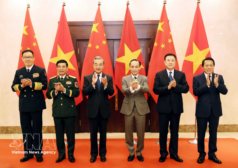 The Vietnamese and Chinese ministers of foreign affairs, national defence and public security pose for a photo at the first ministerial-level “3+3” strategic dialogue in Hanoi on March 16. (Photo: VNA)
