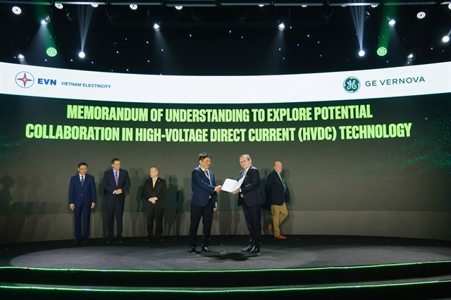 Representatives from EVN and GE Vernova pose for a group photo after signing the MoU. (Photo provided by the company)