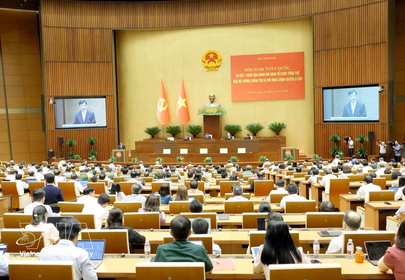 The conference reviews the one-year implementation of the overall organisational model of the political system and the three-tier administration model. (Photo: VNA)