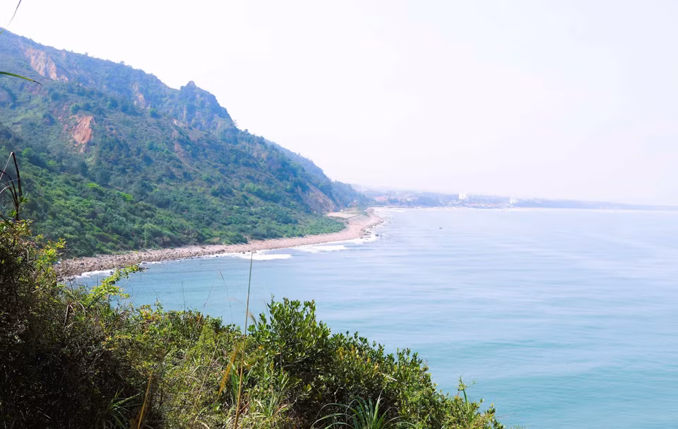 From the base of Rong mountain, Quynh beach stands out with its untouched, tranquil landscape. (Photo: VNA)