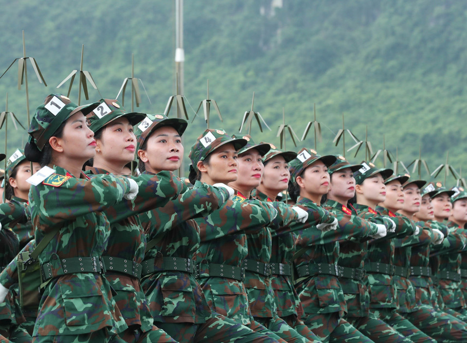 Female information personnel join the rehearsal. (Photo: VNA)