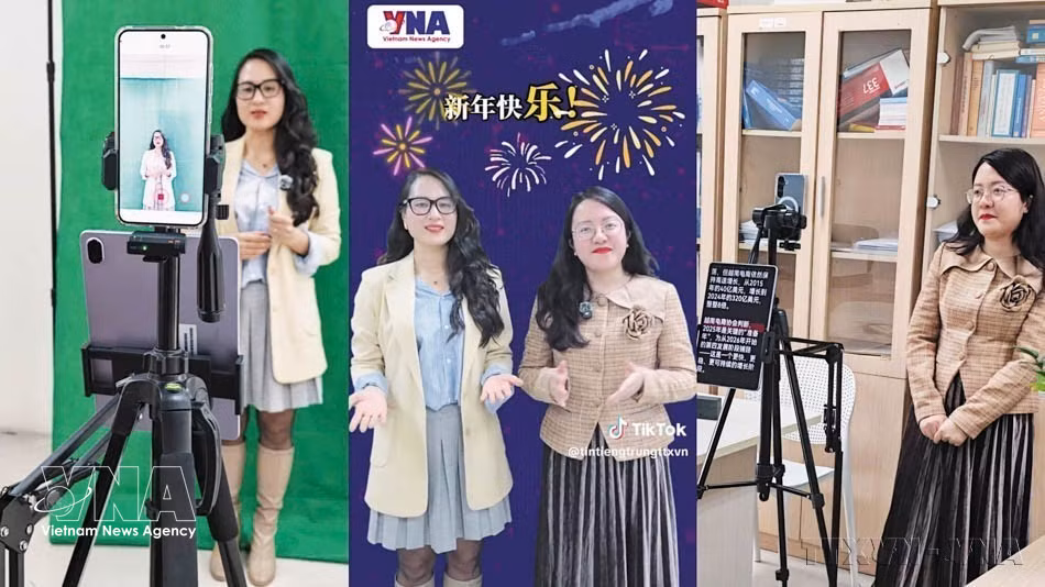 Chinese-language editors Luu Thuy Dung and Tu Bich Ngoc of the Vietnam News Agency record a TikTok video to welcome the Lunar New Year 2026. (Photo: VNA)