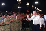 General Secretary of the Communist Party of Vietnam (CPV) and Secretary of the Central Military Commission To Lam attends the special national political–art programme “Under the Glorious Flag” in Hanoi. Photo: VNA)