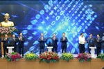 Prime Minister Pham Minh Chinh and delegates launch the national legal portal. (Photo: VNA)
