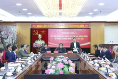 Participants at the meeting. (Photo: VNA)