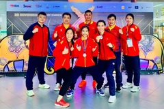 Vietnamese boxers and coaches pose with their medals of the Asian Amateur Boxing Championships 2024. (Photo: VNA) 