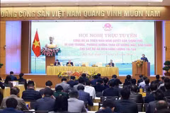 PM Pham Minh Chinh chairs the hybrid conference on December 12. (Photo: VNA)